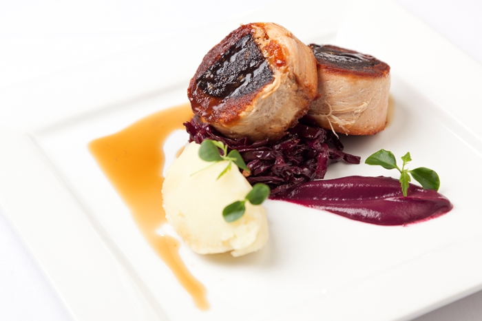 confit belly of pork stuffed with black pudding with braised red