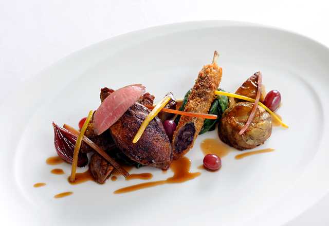 oven roasted squab pigeon with braised crispy leg and foie gras