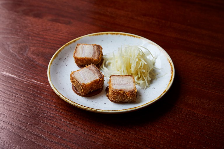 crispy pork belly with brown sauce