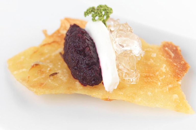 Elderflower jelly with beetroot relish, goat cheese and a caraway tuile