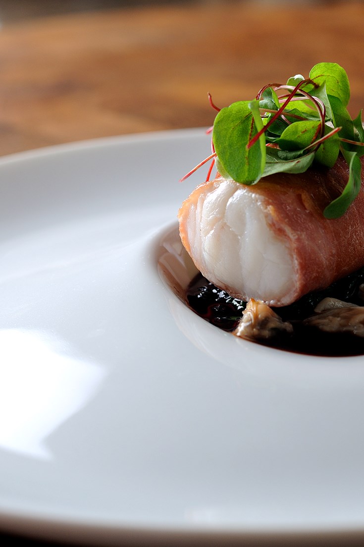 Sous Vide Monkfish Wrapped In Parma Ham With Cockles
