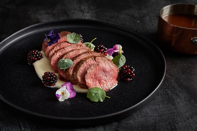 Venison with Jerusalem artichoke purée and pickled blackberries