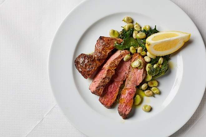 Grilled lamb with braised spinach and broad beans